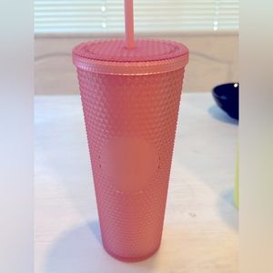 Studded light pink Starbucks tumbler
